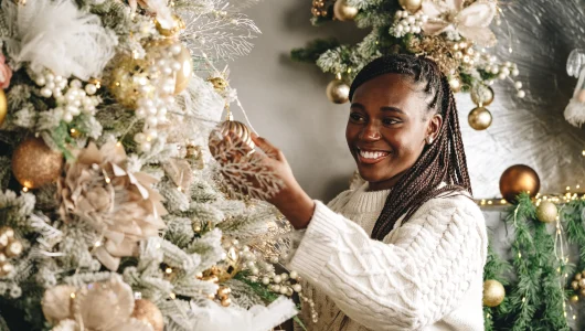 african-woman-preparing-for-winter-holidays-decora-2023-11-27-05-07-51-utc