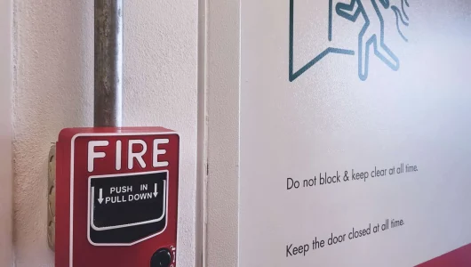 close-up-red-fire-alarm-box-near-emergency-fire-ex-2022-11-07-22-02-47-utc-scaled