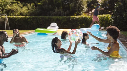 diverse-group-of-friends-having-fun-in-swimming-po-2023-11-27-05-19-22-utc