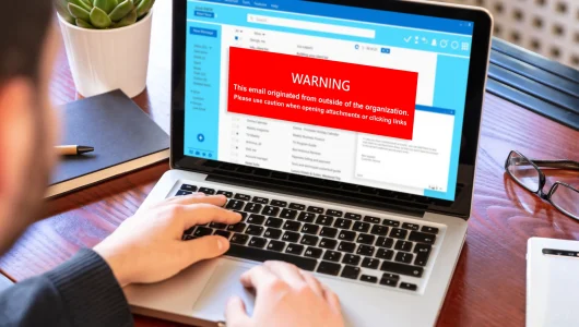 laptop with email attachment warning message