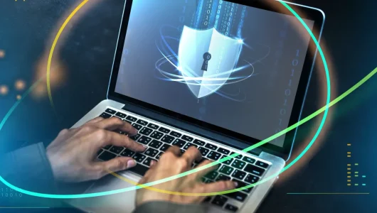 hands-typing-on-a-laptop-with-security-shield-2026-01-07-23-24-09-utc