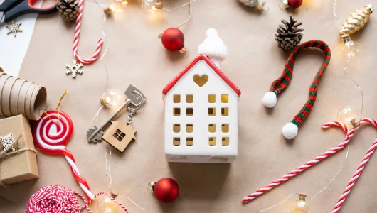 key-to-the-house-with-a-keychain-on-a-cozy-home-wi-2024-11-01-14-55-05-utc