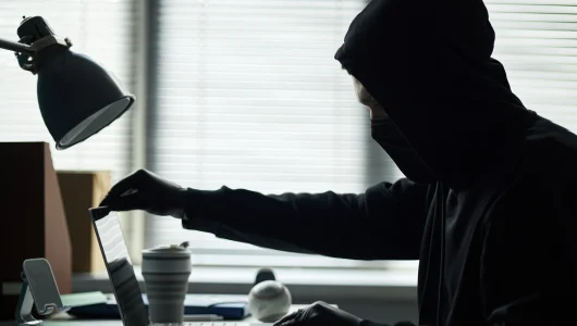 man-wearing-black-hoodie-mask-and-gloves-breaking-2025-09-09-17-05-58-utc