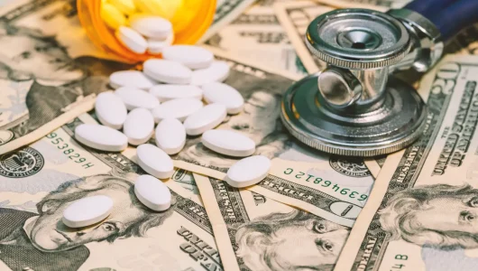 money-and-pills-and-stethoscope-cost-of-medicine-2026-01-05-23-20-39-utc