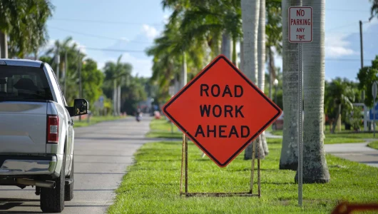 road-work-ahead-sign-on-street-site-as-warning-to-2024-01-30-01-03-54-utc-scaled