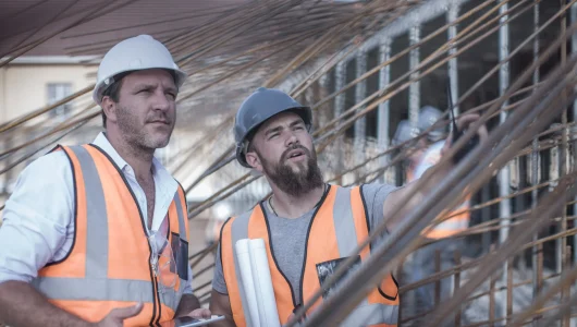 site-manager-and-builder-discussing-steel-rod-stru-2023-11-27-05-08-36-utc