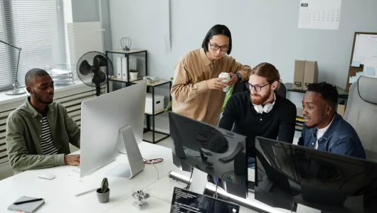 team-of-office-workers-in-casual-clothes-looking-a-2025-03-09-12-46-03-utc (1)